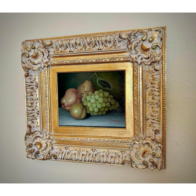 Classic vintage still life oil painting depicting grapes and pears, signed “Therese” lower right. Oil on canvas, c. 1983,...