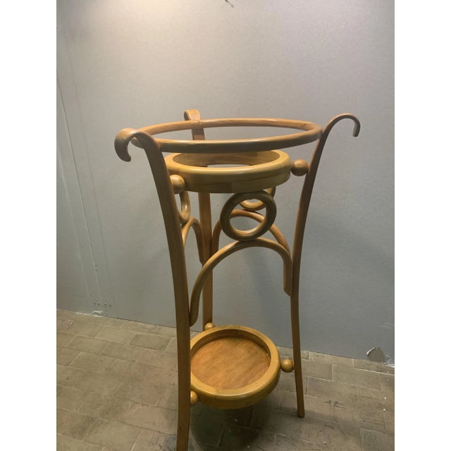 Late 19th Century steam-curved beechwood door made by thonet. Used in the entrances of Austrian hotels This piece has an...