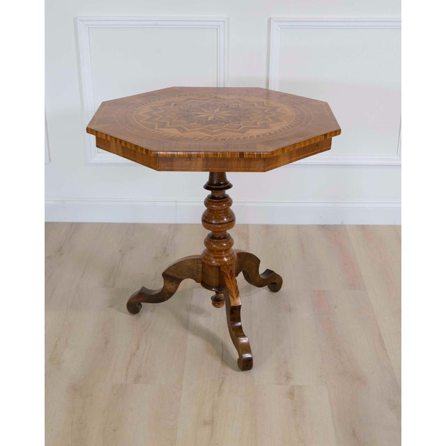 Italian 19th century inlaid walnut sorrento table circa 1890. Fine quality octagonal table beautiful inlaid with olive,...