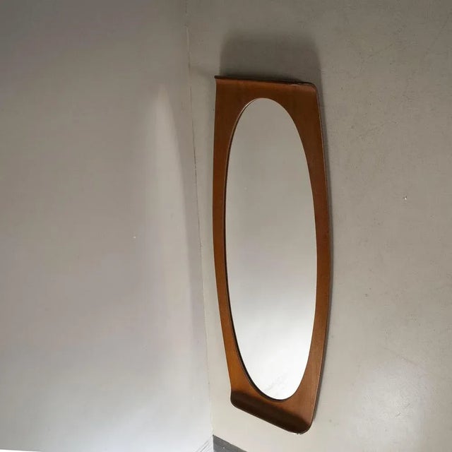 Curved Teak Wall Mirror by Campo E Graffi for Home Field & Scratches, 1960s, in Good conditions. Designed 1960 to 1969 I...