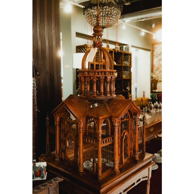 A truly spectacular antique handcrafted bird cage designed in the form of a Gothic cathedral, executed in richly toned...