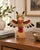 Vintage hand-carved and hand-painted wooden bird totem sculpture from Alaska Black Diamond, accompanied by its original...