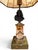 A pair of French bronze and marble miniature table lamps incorporating 18th century statuette elements. Each lamp features...