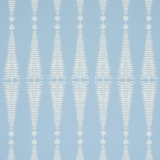 An abstracted motif translated into a striking woven jacquard. Stylized fronds are silhouetted against a solid ground,...