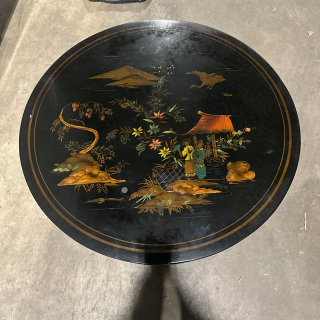 Chinoiserie design Material & Finish: It is made with a black lacquer finish, a traditional technique involving multiple...