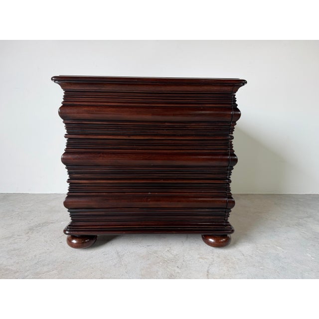 Elegant Tommy Bahama Royal Kahala Collection “Black Sands” nightstand crafted in rich mahogany with a deep dark finish....