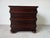 Elegant Tommy Bahama Royal Kahala Collection “Black Sands” nightstand crafted in rich mahogany with a deep dark finish....