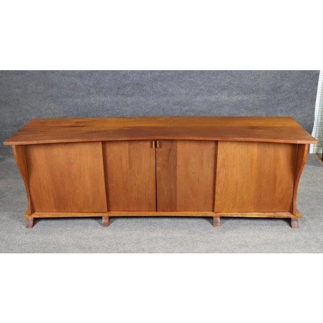 This exquisite **Mid-Century Modern live-edge walnut sideboard** is a masterclass in organic design and handcrafted...