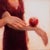 Before and Now Seems Infinite by Ken Cunningham | Oil on cradled panel Depiction of hands with an apple. For Sale