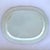 An authentic, early 19th-century English pearlware oval serving platter featuring a classic hand-brushed blue feather-edge...