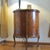 Neither museum quality nor abused. Some light wear and tear on the top edge. Top protected by glass. Marquetry is clean....