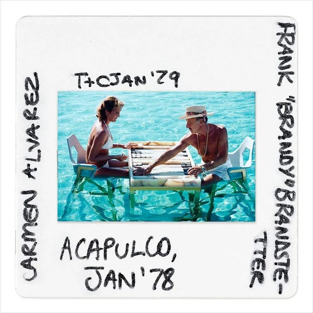 Keep Your Cool Slide 1978 Slide of a photograph showing Carmen Alvarez enjoying a game of backgammon with Frank ‘Brandy’...