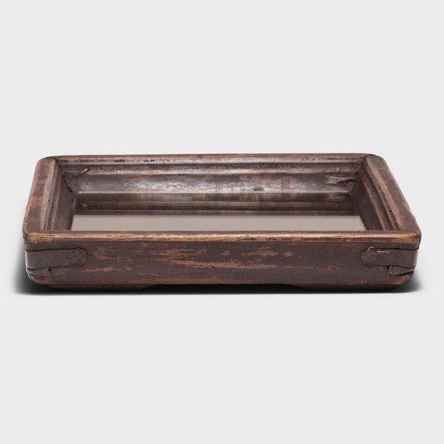 Simple lines, a modest form and a layer of hand-brushed lacquer give this petite wooden tray a provincial charm that...