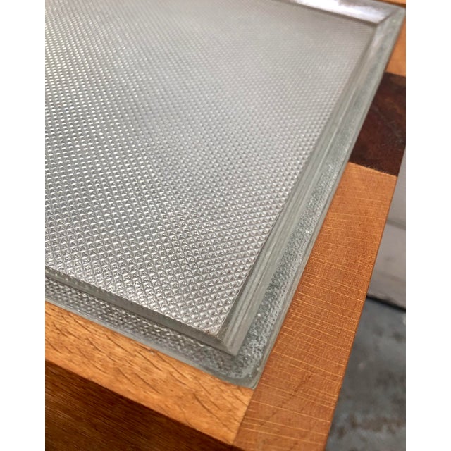 A contemporary hand-made end table made of vintage glass block, oak and mahogany. By South African artist Peter Osborn.