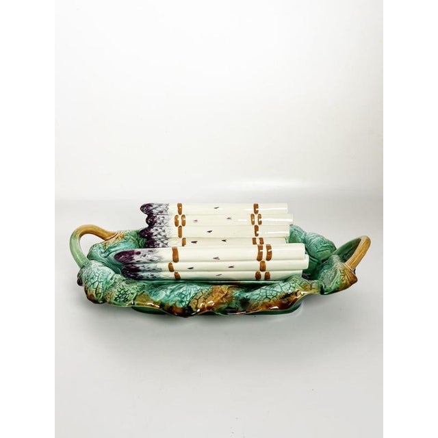 Decorative French majolica asparagus serving dish dating from the 19th century, featuring a highly naturalistic design...