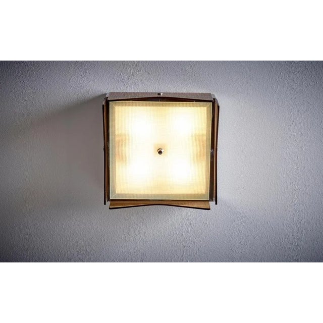 1960s Design Italian Wall Lamp nos in tinted brown glass. Up to 250V (Europe/UK Standard).The wiring of this item may be...