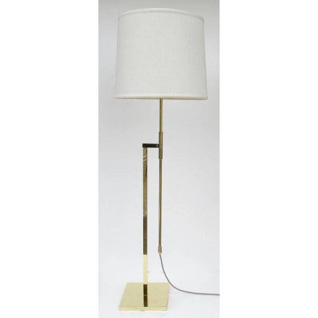 Vintage; C.1960s, Mid-Century, an original Laurel Lamp Company, adjustable brass floor lamp. This unique and weighted...