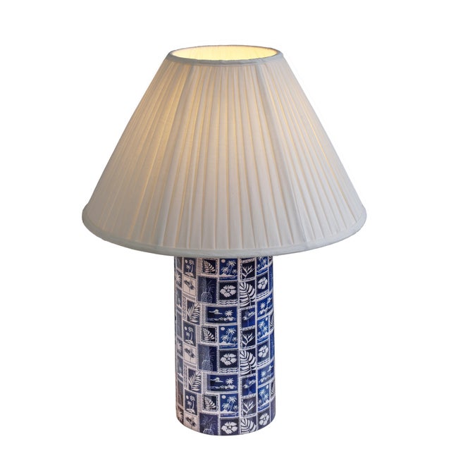 The Stamp pleated table lamp adds a playful, retro touch to any room. Its iron base is covered in a fun Memphis-inspired...