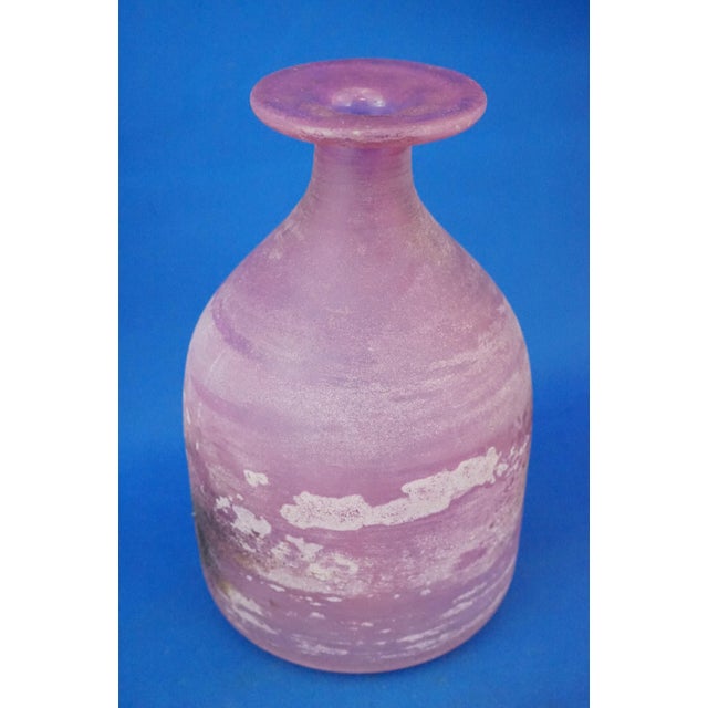 Item description: Small bottle-shaped excavation vase, with a cylindrical body, inverted funnel shoulder, and elongated...
