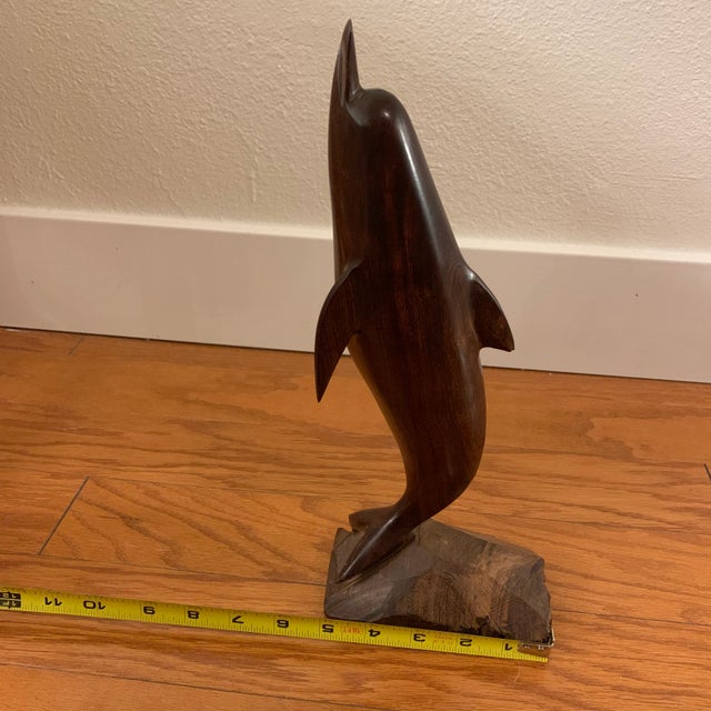 Vintage hand carved, Ironwood sculpture of a dolphin. Desert Ironwood is the hardest wood in the world, very difficult to...