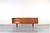This teak sideboard was manufactured in Denmark in the 1960s. The piece has been professionally and carefully restored by...
