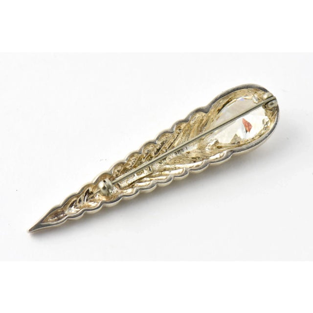 Modernist sterling silver and cubic zirconia brooch designed by Polly Bergen. Polly Bergen (1930-2014) was an American...