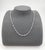 This necklace showcases a refined blend of elegance and craftsmanship. Featuring 8 natural, round-cut white diamonds...