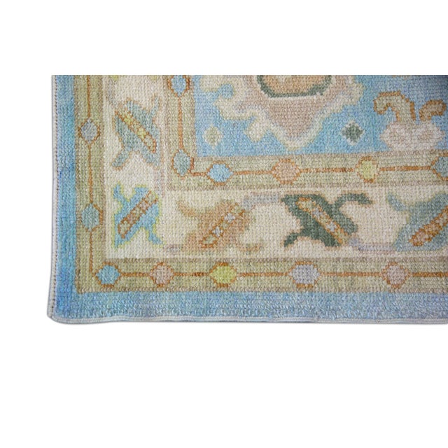 Enhance your living space with the timeless beauty of this Handmade Modern Turkish Oushak Rug. Measuring 2'9" x 3'5", this...