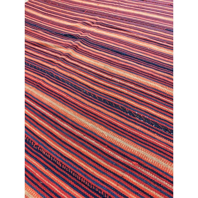 this mid-20th-century Turkish Decorative textile is a beautiful testament to Anatolian tribal flat-weaving craftsmanship....