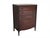 A well-proportioned five-drawer chest by Kindel, featuring fluted corner details and carved rosettes at the feet. The warm...