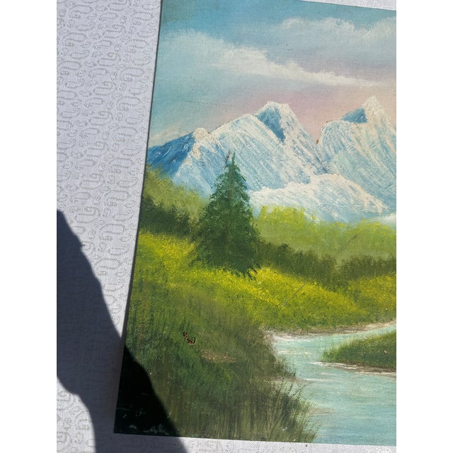Up for consideration is a beautiful vintage mountains and creek landscape painting on canvas signed by the artist. This...