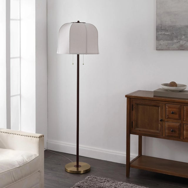 Illuminate your space with style and sophistication with the MASEY 63.75 inch red and gold metal floor lamp. This striking...