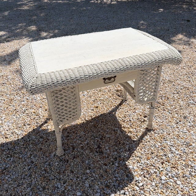 Shabby chic painted wicker type desk with drawer. Wicker is really a rope- it’s been painted- see photos. The drawer pulls...