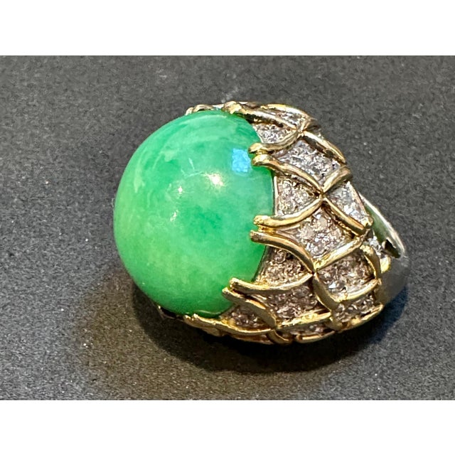 This stunning cocktail ring features a GIA certified 40 carat jadeite jade and 4 carat diamond, set in 18 karat yellow...