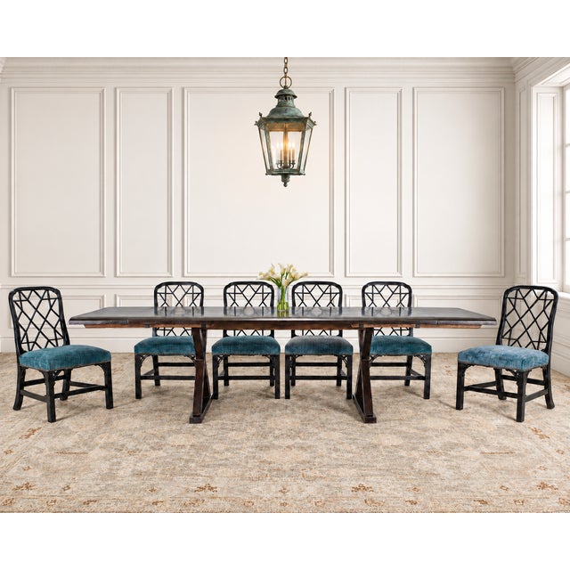 An impressive set of eight matching ebonized hardwood dining chairs made by Hickory Chair Furniture in North Carolina. The...