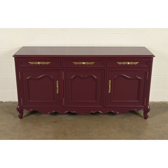 A gorgeous French Provincial Louis XV style sideboard, bar cabinet, or credenza In the manner of Baker Furniture By J.L....