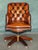 Handsome vintage Chesterfield Tufted leather Captain's desk or office chair, dating to the latter part of the 20th...