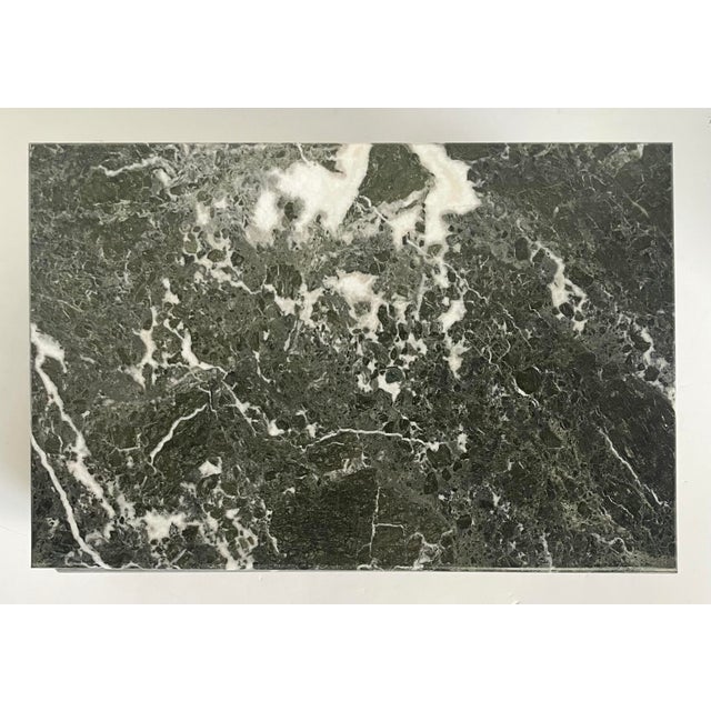 Here is a vintage green marble hinged box, likely made in Italy, featuring richly toned stone and brass detailing. The box...