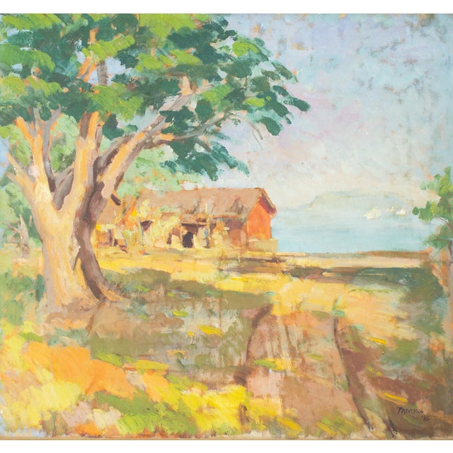 A 1946 oil on canvas landscape painting. The vibrant scene depicts a red building and large tree against a cloudy blue...