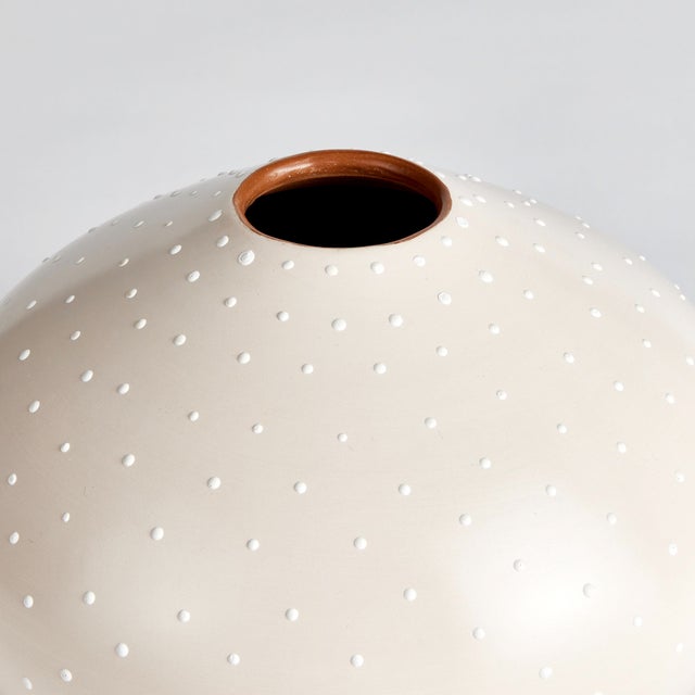 Made in Chulucanas Peru, this handcrafted vase is the product of warm climate, Peruvian clay and an artisans touch....