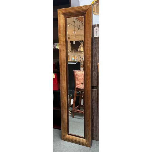 Design Plus Gallery presents an Antique Rattan Floor Mirror. This unique piece is aged with new latches on the backside to...