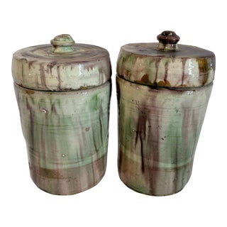 Pair of Terra Cotta Drip Glaze Jars With Lids For Sale