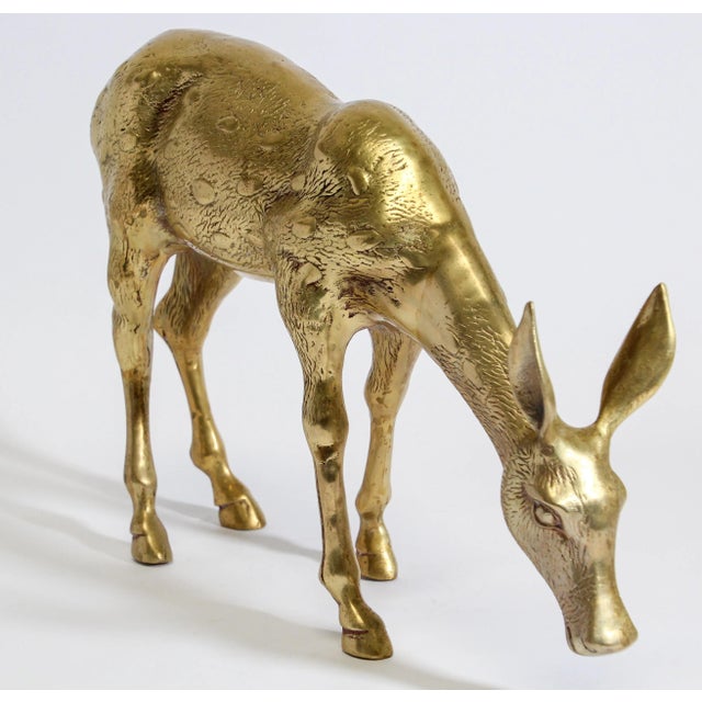 Gorgeous and substantial, striking iconic 1960s Hollywood Regency vintage Sarreid style cast brass standing doe sculpture....