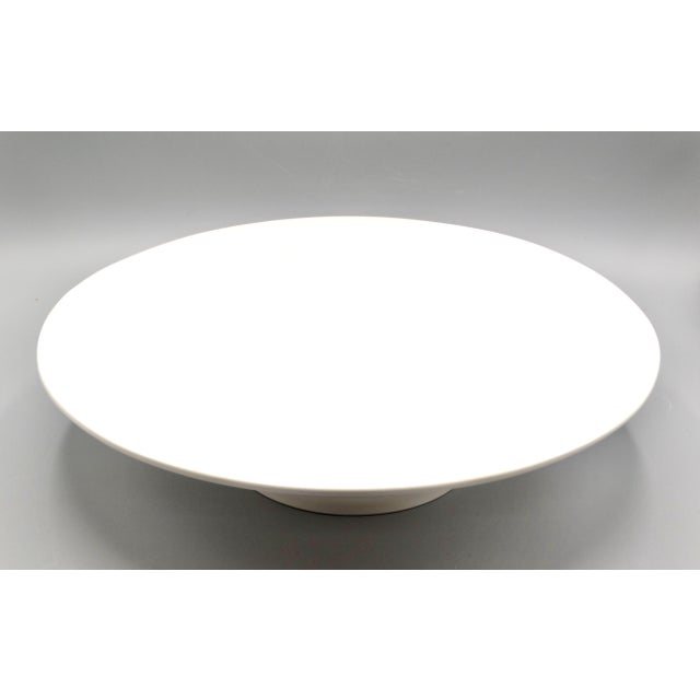 Antique French white ironstone cake stand on pedestal base. With clean, modern lines, this piece works equally well in...