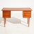 Danish teak desk with six-drawers from the 1970s. The wooden parts of the dresser have been completely restored. The key...