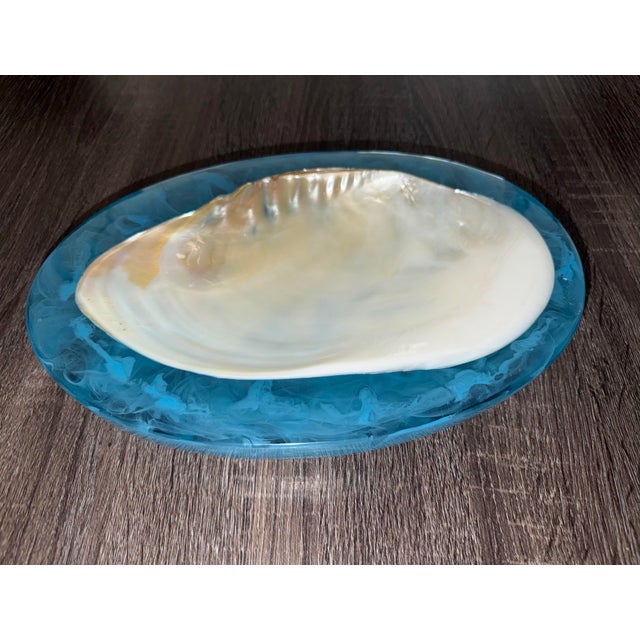 Made Goods / Lily Juliet Ice Blue Resin Shell Large Caviar Dish Cebu Clam Coastal Decor The Large Caviar Dish in Ice Blue...