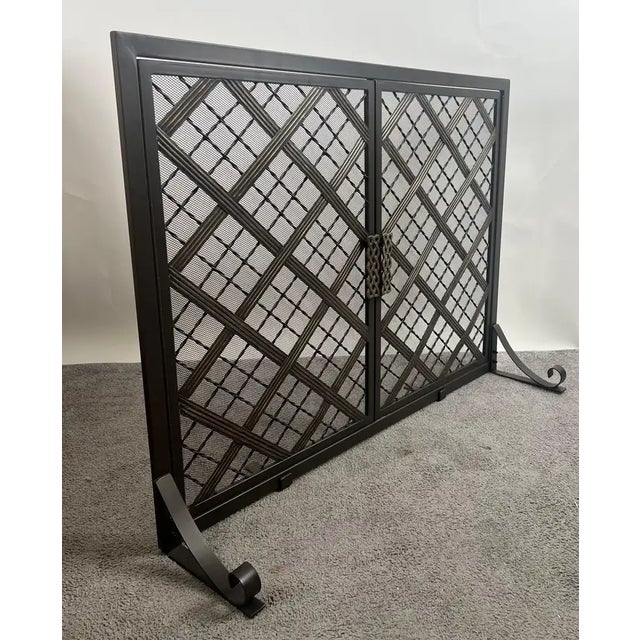 Art Deco Style Black & Bronzed Metal Two-Door & Diamond Design Fireplace Screen: The Art Deco style fireplace screen...