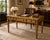 Bring vintage sophistication to your space with this Italian-inspired writing desk, finished in a richly distressed gold...