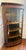 This China cabinet is designed for the elegant displays of China or collectibles with internal wooden shelving. It is a...