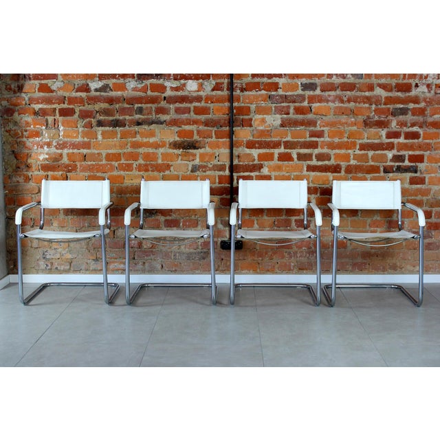 Set of four vintage Italian cantilever chairs in Bauhaus style from the 1980s, upholstered in original white leather on a...